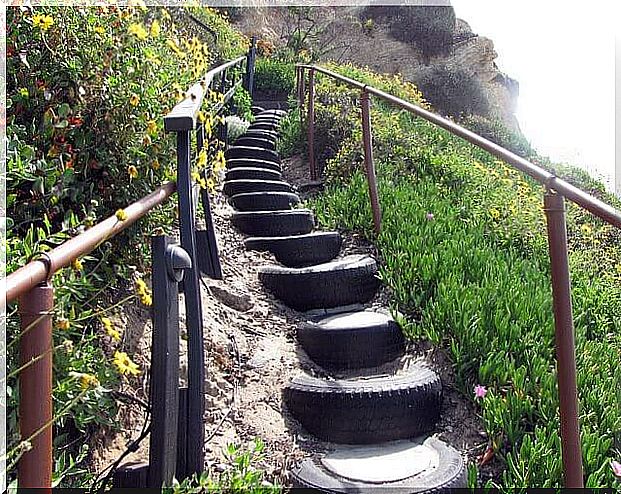 Car tires as steps on steep slopes