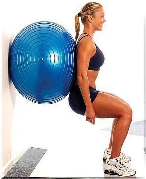 Woman doing squats for bum