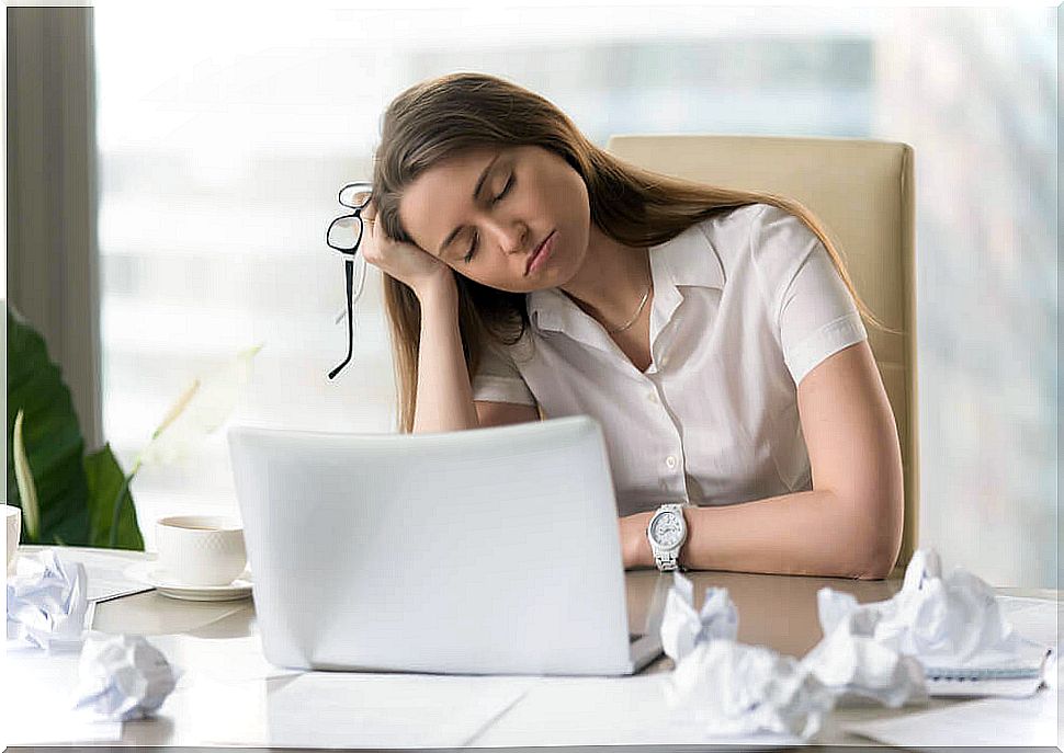 Tired woman at the computer
