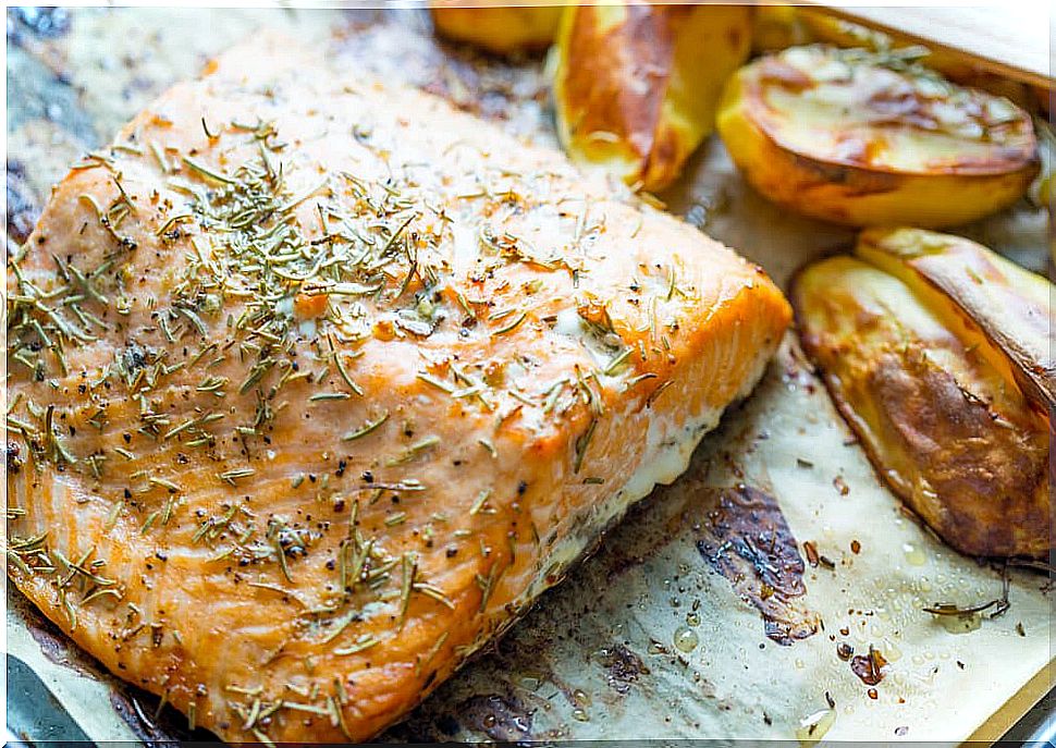 Baked salmon with potatoes and vegetables