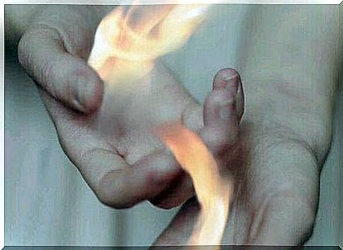 Hands with fire symbolize coping with feelings