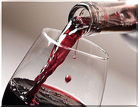 Red wine is poured out